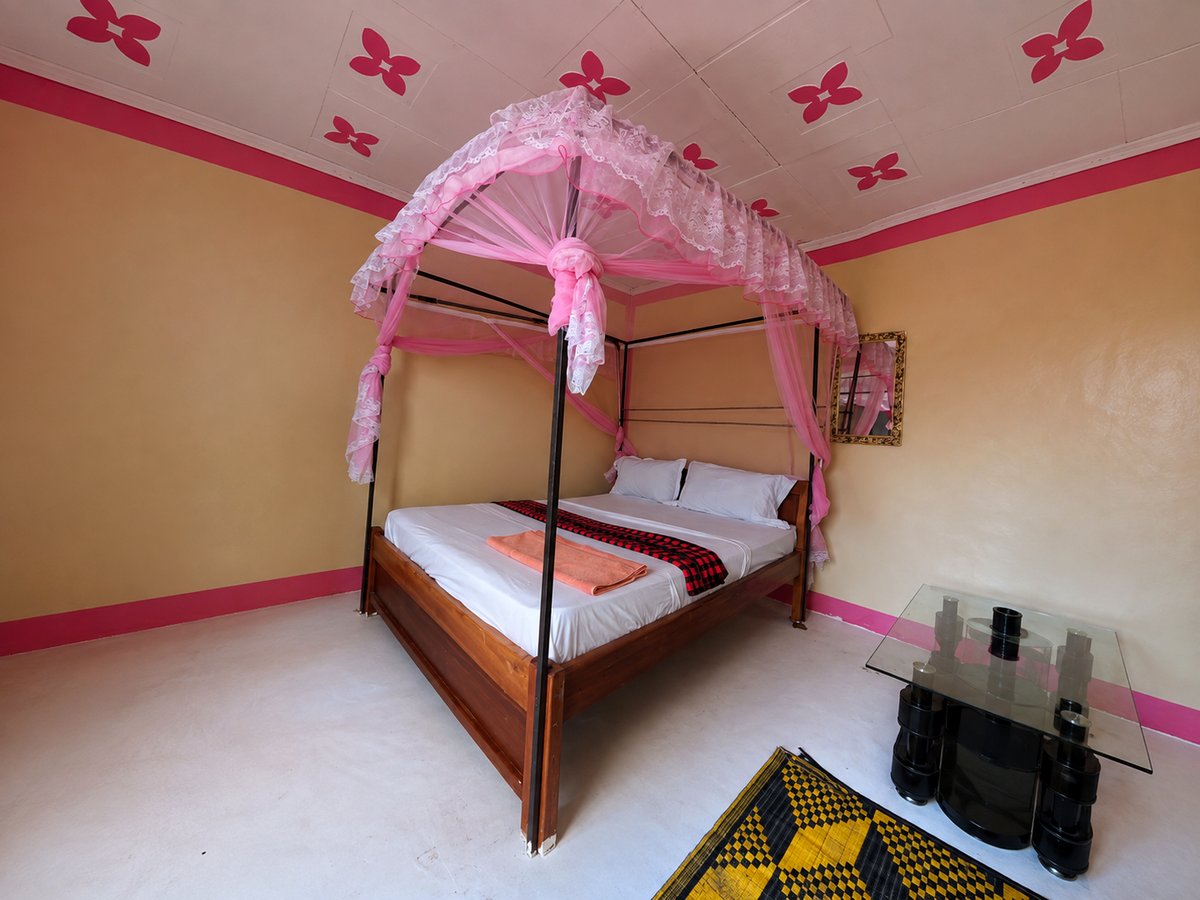 A double bedroom inside the Loita House at Nguruman Waterfront Resort