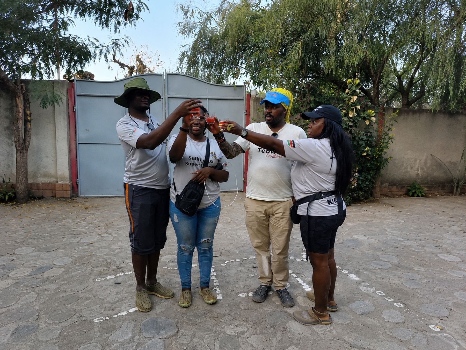 Guests toasting together at the resort during a group trip